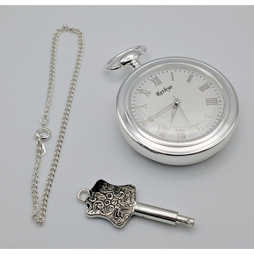 657 - Two Silver Plated Pocket Watches Comprising 1) A Key Wind Manual Pocket Watch with Chain and 2) A To... 