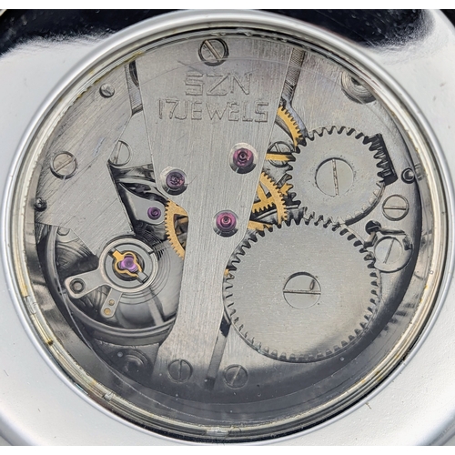 657 - Two Silver Plated Pocket Watches Comprising 1) A Key Wind Manual Pocket Watch with Chain and 2) A To... 