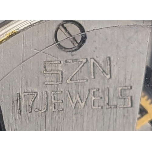 657 - Two Silver Plated Pocket Watches Comprising 1) A Key Wind Manual Pocket Watch with Chain and 2) A To... 