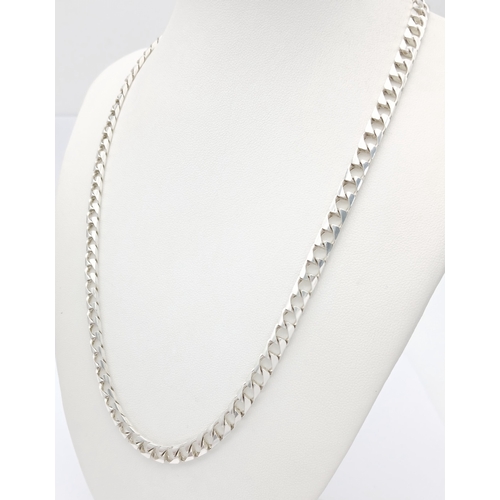 692 - A Heavy Sterling Silver Curb Link Chain Necklace-50cm Length. The Necklace measures 6mm Wide and has... 