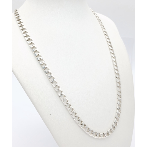 692 - A Heavy Sterling Silver Curb Link Chain Necklace-50cm Length. The Necklace measures 6mm Wide and has... 