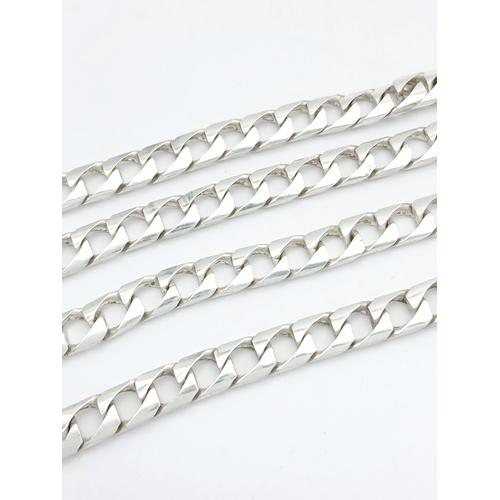 692 - A Heavy Sterling Silver Curb Link Chain Necklace-50cm Length. The Necklace measures 6mm Wide and has... 