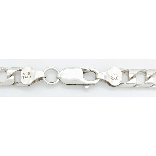 692 - A Heavy Sterling Silver Curb Link Chain Necklace-50cm Length. The Necklace measures 6mm Wide and has... 