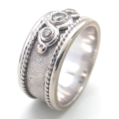14 - Magnificent 9 CARAT WHITE GOLD BAND RING having 3 x Brilliant Cut DIAMONDS SET TO TOP.  Rope Border ... 