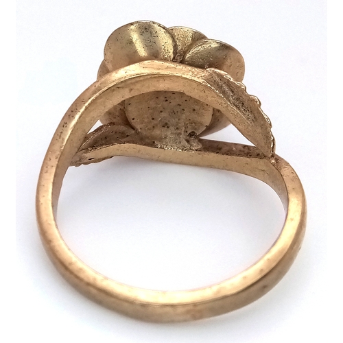 26 - A 9K Yellow Gold Ring with Ornate Rose Decoration. Size M 1/2. 5.95g.
