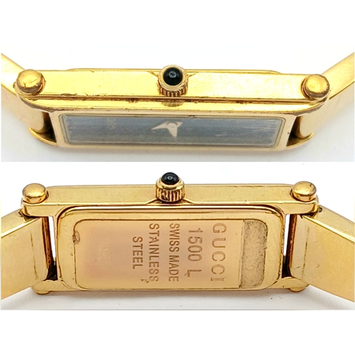 649 - A LADIES GUCCI, GOLD TONE BANGLE WATCH. MODEL 1500L. IN FULL WORKING ORDER, NEW BATTERY FITTED RECEN... 