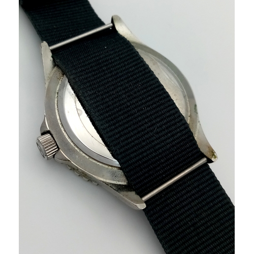 670 - A BEN SHERMAN, THE ORIGINAL, GREY MILITARY MATERIAL STRAP WATCH. IN FULL WORKING ORDER AND WITH ORIG... 