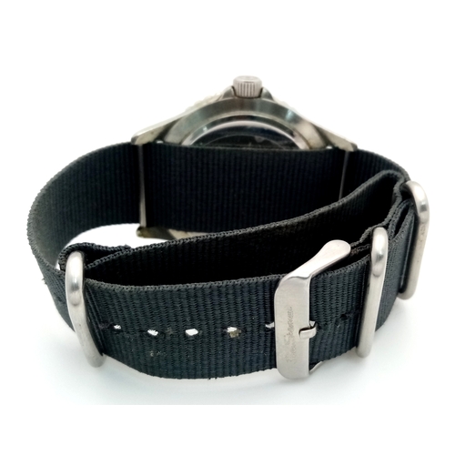 670 - A BEN SHERMAN, THE ORIGINAL, GREY MILITARY MATERIAL STRAP WATCH. IN FULL WORKING ORDER AND WITH ORIG... 