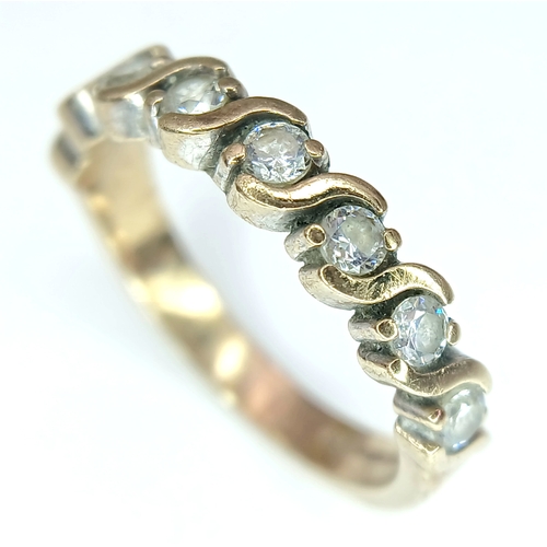 84 - Beautiful modern interpretation of a 9 CARAT GOLD ‘HALF ETERNITY’  RING. Full UK hallmark. 3.0 Grams... 