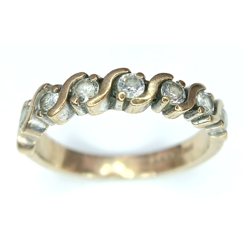 84 - Beautiful modern interpretation of a 9 CARAT GOLD ‘HALF ETERNITY’  RING. Full UK hallmark. 3.0 Grams... 