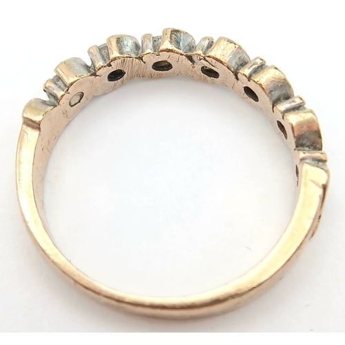 84 - Beautiful modern interpretation of a 9 CARAT GOLD ‘HALF ETERNITY’  RING. Full UK hallmark. 3.0 Grams... 