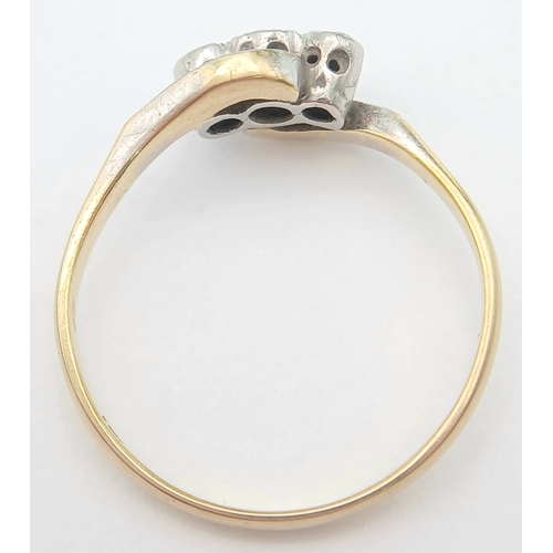 91 - Antique 18 CARAT GOLD, CROSSOVER STYLE RING with DIAMONDS in PLATINUM. 2.4 GRAMS. Size O.