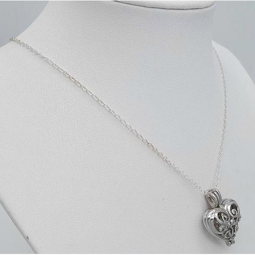 1191 - A 925 silver Filigree heart pendant, set on a silver chain necklace. Total weight 5.4G. Total length... 