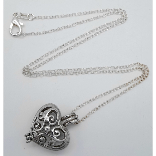 1191 - A 925 silver Filigree heart pendant, set on a silver chain necklace. Total weight 5.4G. Total length... 