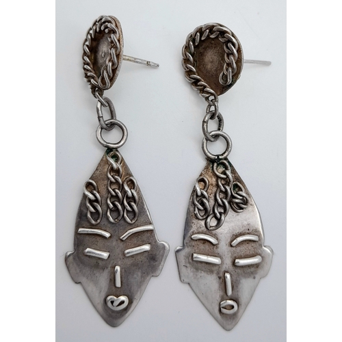1255 - A Pair of Vintage Silver Drop Earrings with Tribal Mask Form. 5cm drop. 6.3g. No backs.