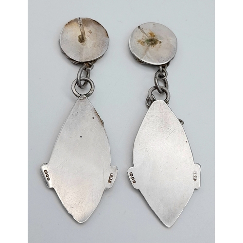 1255 - A Pair of Vintage Silver Drop Earrings with Tribal Mask Form. 5cm drop. 6.3g. No backs.