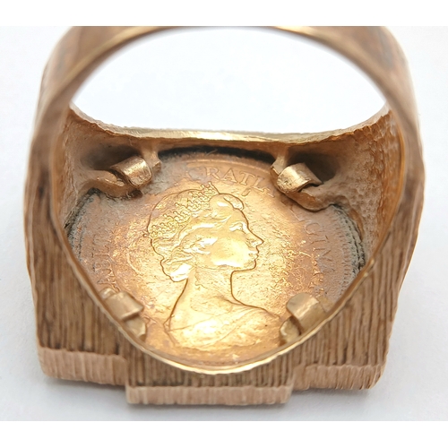 37 - A 1982 HALF SOVEREIGN COIN SET IN A 9K GOLD RING .      13.5gms TOTAL WEIGHT            SIZE Q/R