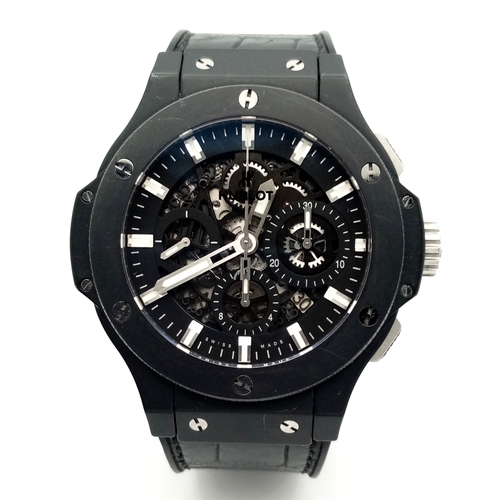 A Hublot Big Bang Aero Automatic Gents Watch. Model 311.C1.1170.GR. Black rubber bracelet. Ceramic case - 44mm. Black dial with three sub dials. In good condition and working order. Comes with box and an array of papers. Ref: 010174.