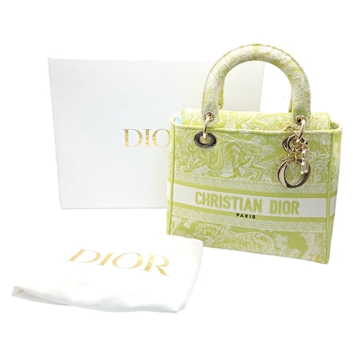 346 - A Christian Dior Green and White Lady D-Lite Bag. Toile de jouy embroidered textile exterior with go... 