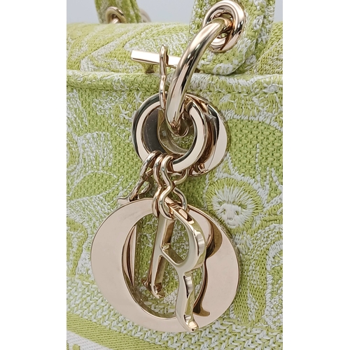 346 - A Christian Dior Green and White Lady D-Lite Bag. Toile de jouy embroidered textile exterior with go... 