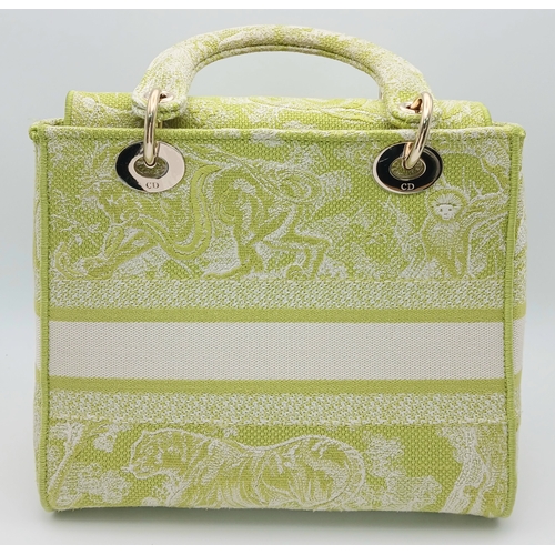 346 - A Christian Dior Green and White Lady D-Lite Bag. Toile de jouy embroidered textile exterior with go... 