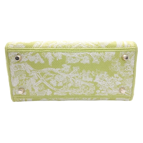 346 - A Christian Dior Green and White Lady D-Lite Bag. Toile de jouy embroidered textile exterior with go... 