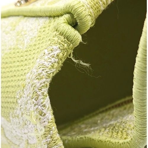 346 - A Christian Dior Green and White Lady D-Lite Bag. Toile de jouy embroidered textile exterior with go... 