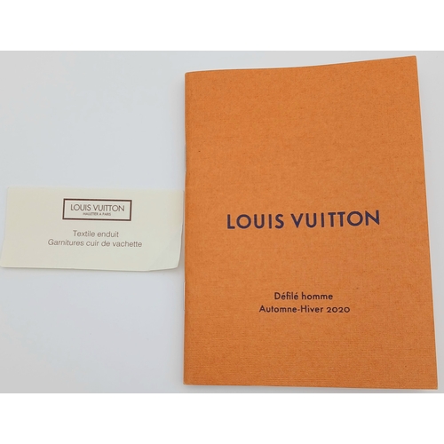 627 - A Louis Vuitton Monogram Clouds Pochette. Crafted in blue monogram coated canvas featuring the disti... 