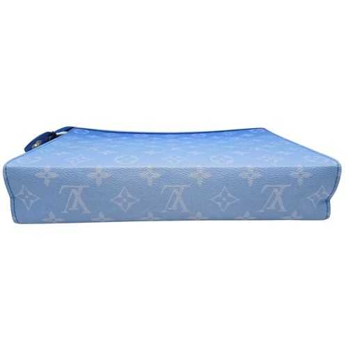 627 - A Louis Vuitton Monogram Clouds Pochette. Crafted in blue monogram coated canvas featuring the disti... 