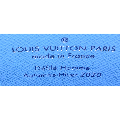 627 - A Louis Vuitton Monogram Clouds Pochette. Crafted in blue monogram coated canvas featuring the disti... 