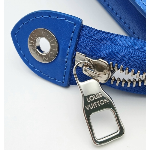 627 - A Louis Vuitton Monogram Clouds Pochette. Crafted in blue monogram coated canvas featuring the disti... 