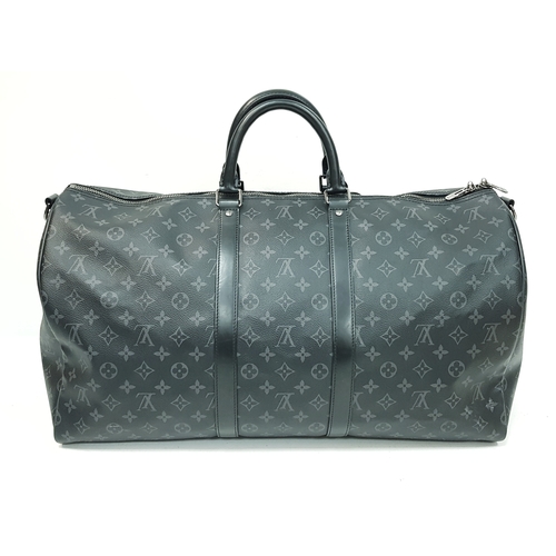 620 - A Louis Vuitton Monogram Eclipse Keepall Bandoulière 55 Travel Bag. Crafted in grey-on-black monogra... 