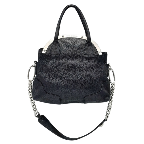 1150 - A Dolce & Gabbana Black Leather Handbag. Crafted from grained black leather with silver-tone hardwar... 