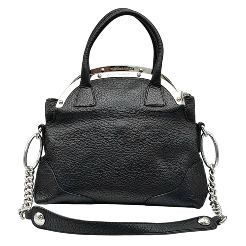 1150 - A Dolce & Gabbana Black Leather Handbag. Crafted from grained black leather with silver-tone hardwar... 