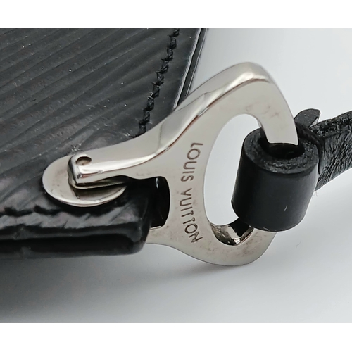 1209 - A Louis Vuitton Epi Leather Pochette. Crafted in black Epi leather with the signature textured finis... 