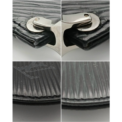 1209 - A Louis Vuitton Epi Leather Pochette. Crafted in black Epi leather with the signature textured finis... 