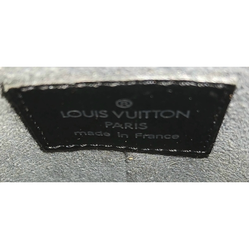 1209 - A Louis Vuitton Epi Leather Pochette. Crafted in black Epi leather with the signature textured finis... 
