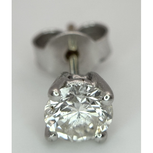 1234 - A Single 18K White Gold Diamond Stud Earring. 0.70ct round brilliant cut having J colour and I1 clar... 