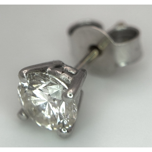 1234 - A Single 18K White Gold Diamond Stud Earring. 0.70ct round brilliant cut having J colour and I1 clar... 