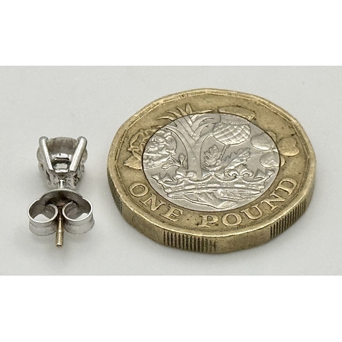 1234 - A Single 18K White Gold Diamond Stud Earring. 0.70ct round brilliant cut having J colour and I1 clar... 