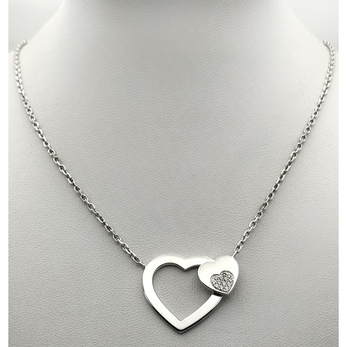 1229 - An 18K White Gold and Diamond 