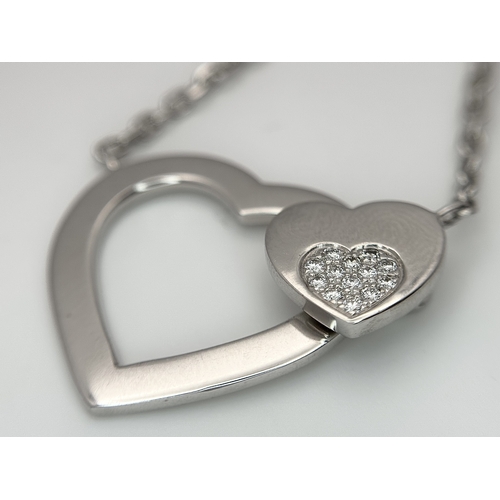 1229 - An 18K White Gold and Diamond 