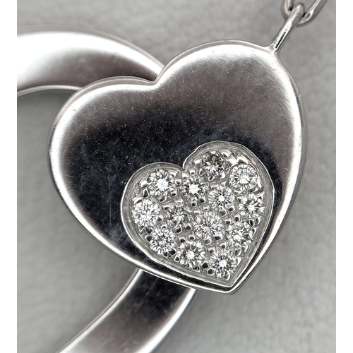 1229 - An 18K White Gold and Diamond 