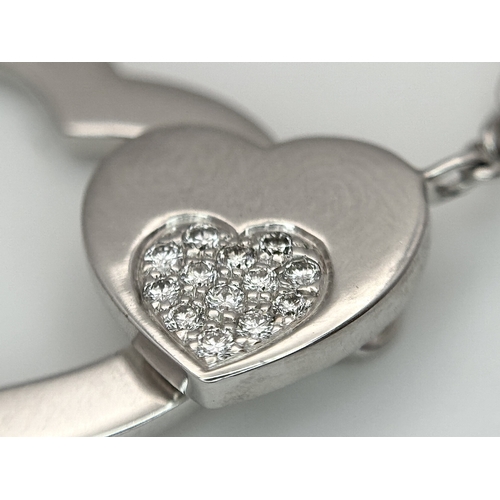 1229 - An 18K White Gold and Diamond 