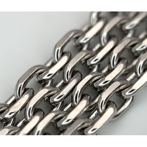 1229 - An 18K White Gold and Diamond 