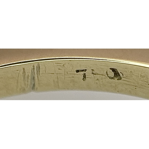 1243 - A Classic 18K Yellow Gold, Sapphire and Diamond Ring. Gorgeous 2ct oval cut green sapphire with 0.70... 