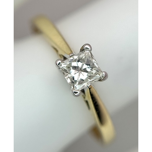 1257 - An 18K Yellow Gold Diamond Solitaire Ring. A 0.33ct Princess cut diamond having H colour and SI1 cla... 
