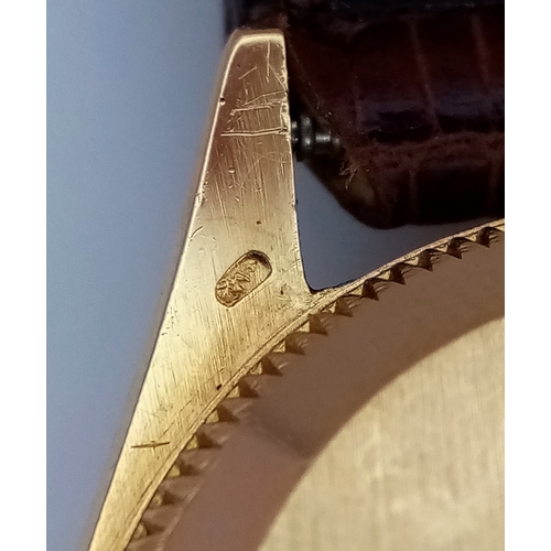 177 - A 18K Gold Rolex Oyster Perpetual Gold Ladies Automatic Watch. Brown leather strap. 18K gold case. S... 