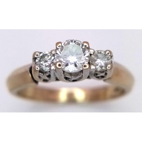 23 - A 18K GOLD VINTAGE 3 STONE DIAMOND RING WITH PLATINUM SETTING .    4.4gms    size O   .45cwt