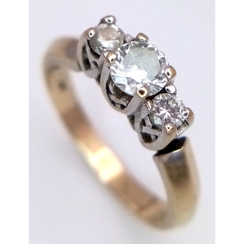 23 - A 18K GOLD VINTAGE 3 STONE DIAMOND RING WITH PLATINUM SETTING .    4.4gms    size O   .45cwt